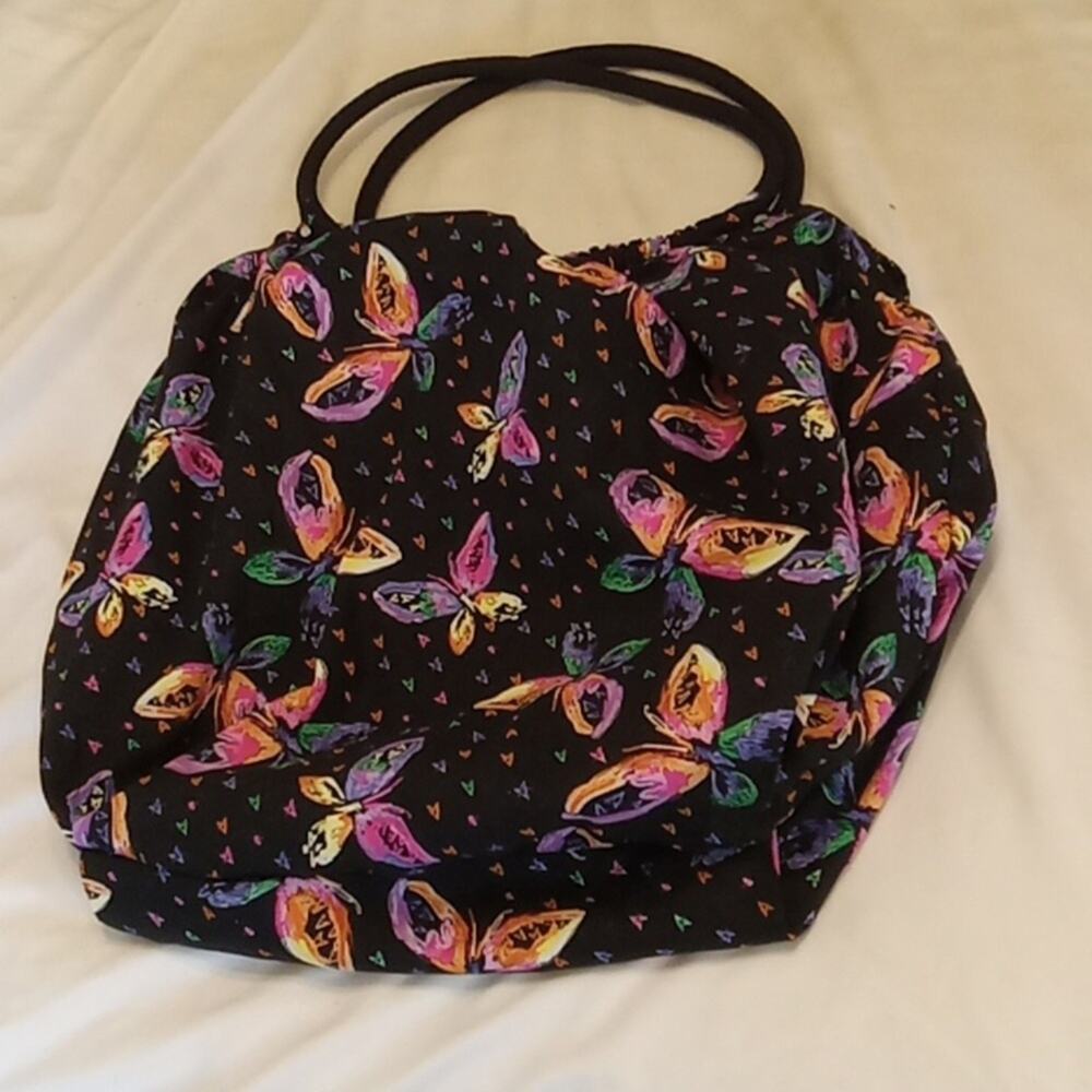 Vintage Steve Madden Black Butterflies circular handle over the Shoulder purse.